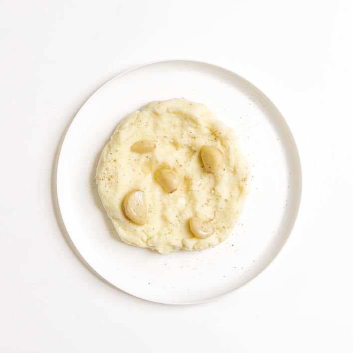 Whipped Yukon gold potatoes with roasted garlic, nutmeg and buttermilk - Price varies with selection